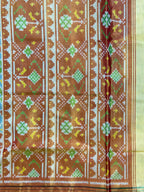 SkyBlue Navratna Design Tissue Double Zari Patola Saree