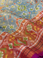 SkyBlue Navratna Design Tissue Double Zari Patola Saree
