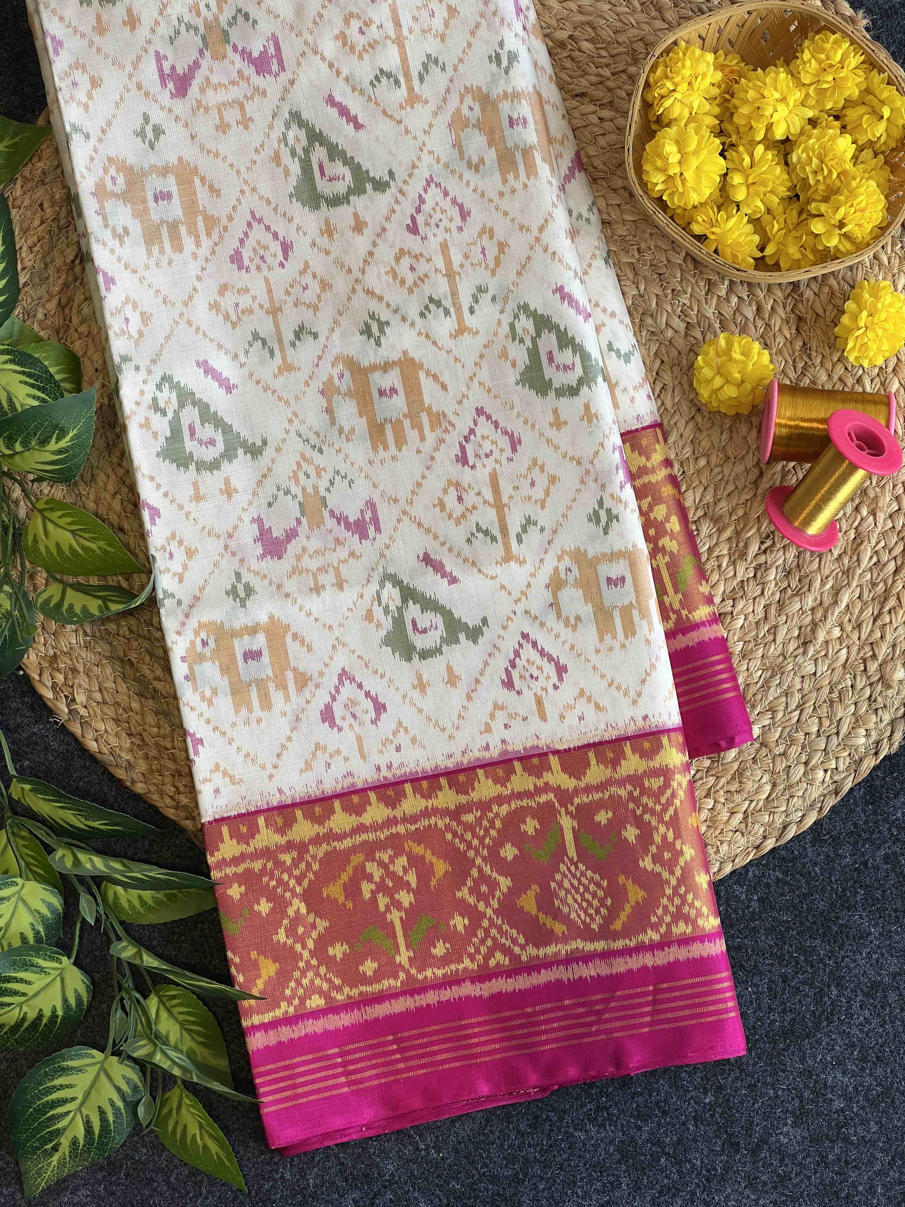 White Narikunj with Pink Pallu Traditional Design Handwoven Patola Silk Saree