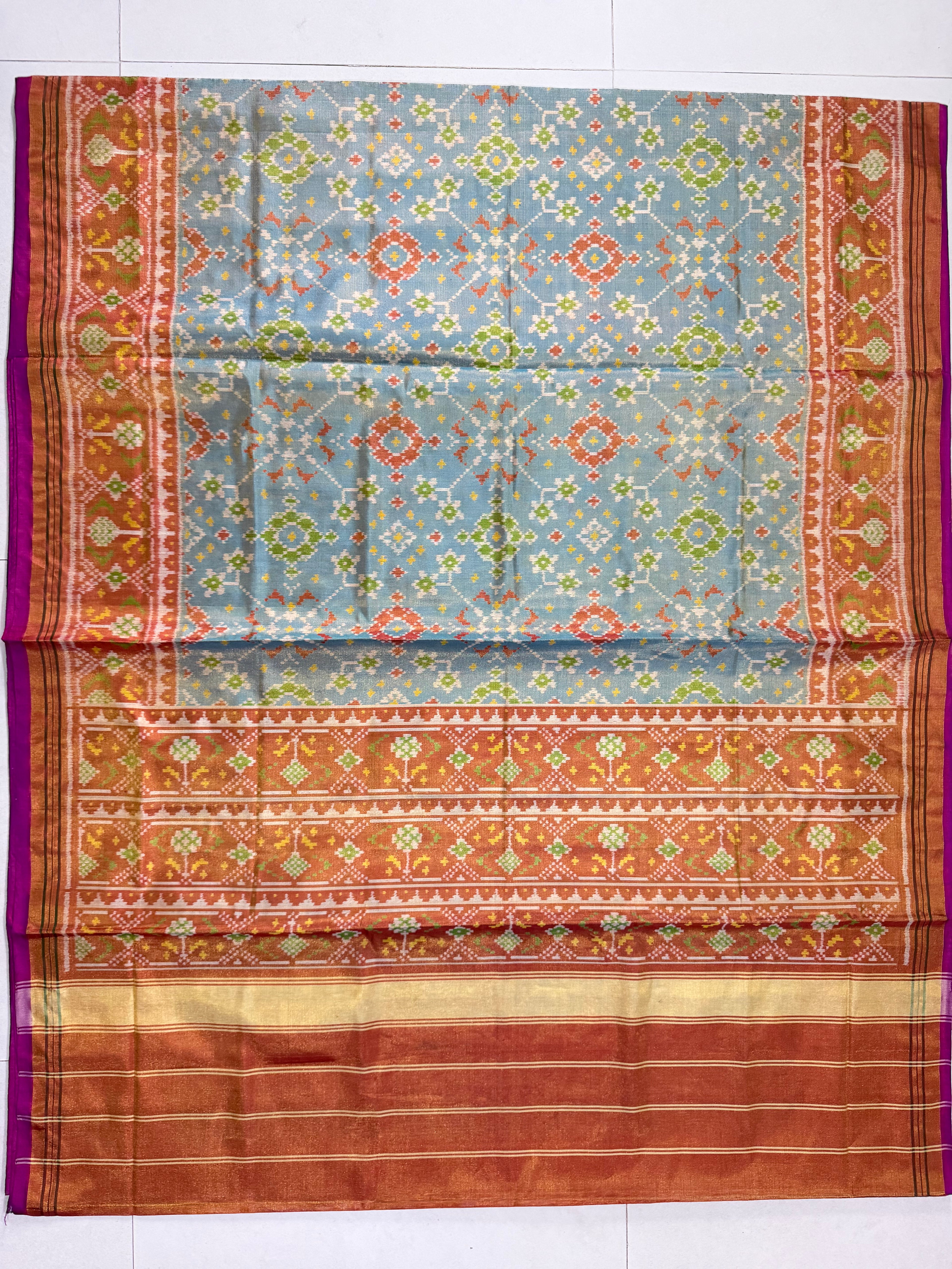 SkyBlue Navratna Design Tissue Double Zari Patola Saree