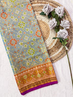 SkyBlue Navratna Design Tissue Double Zari Patola Saree