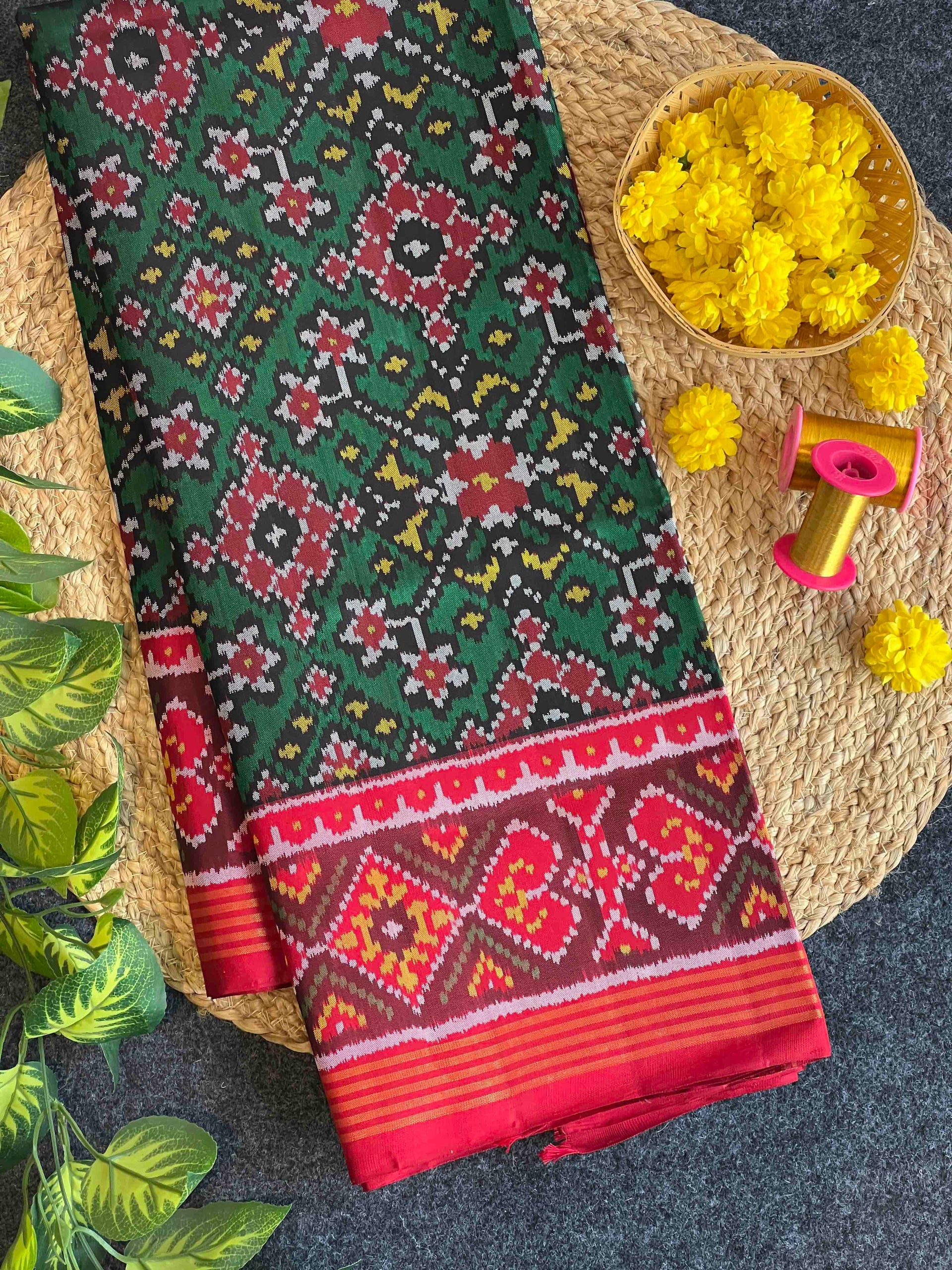 Green Navratna Design Handwoven Patola Silk Saree Main image