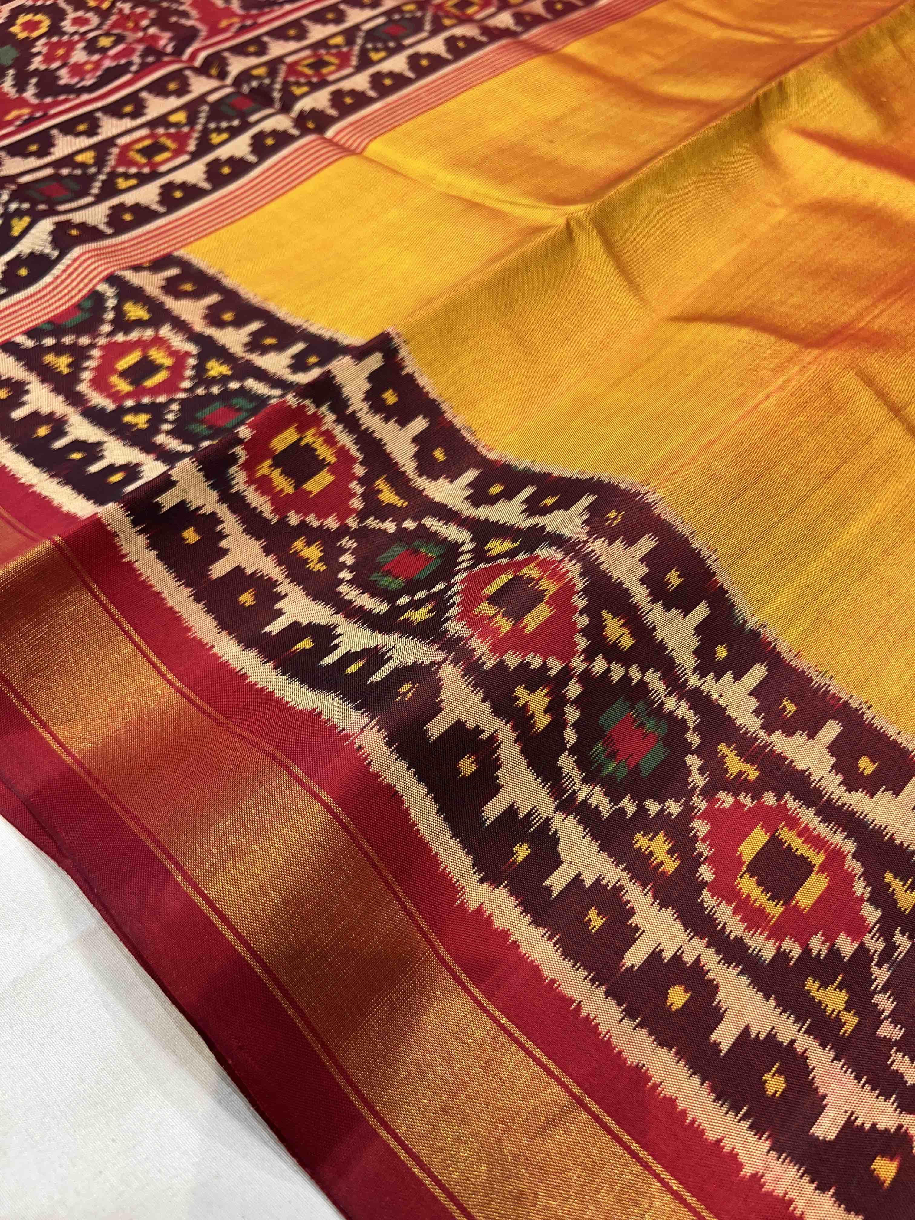 Mustard Plain Gala Border Handwoven Patola Silk Saree