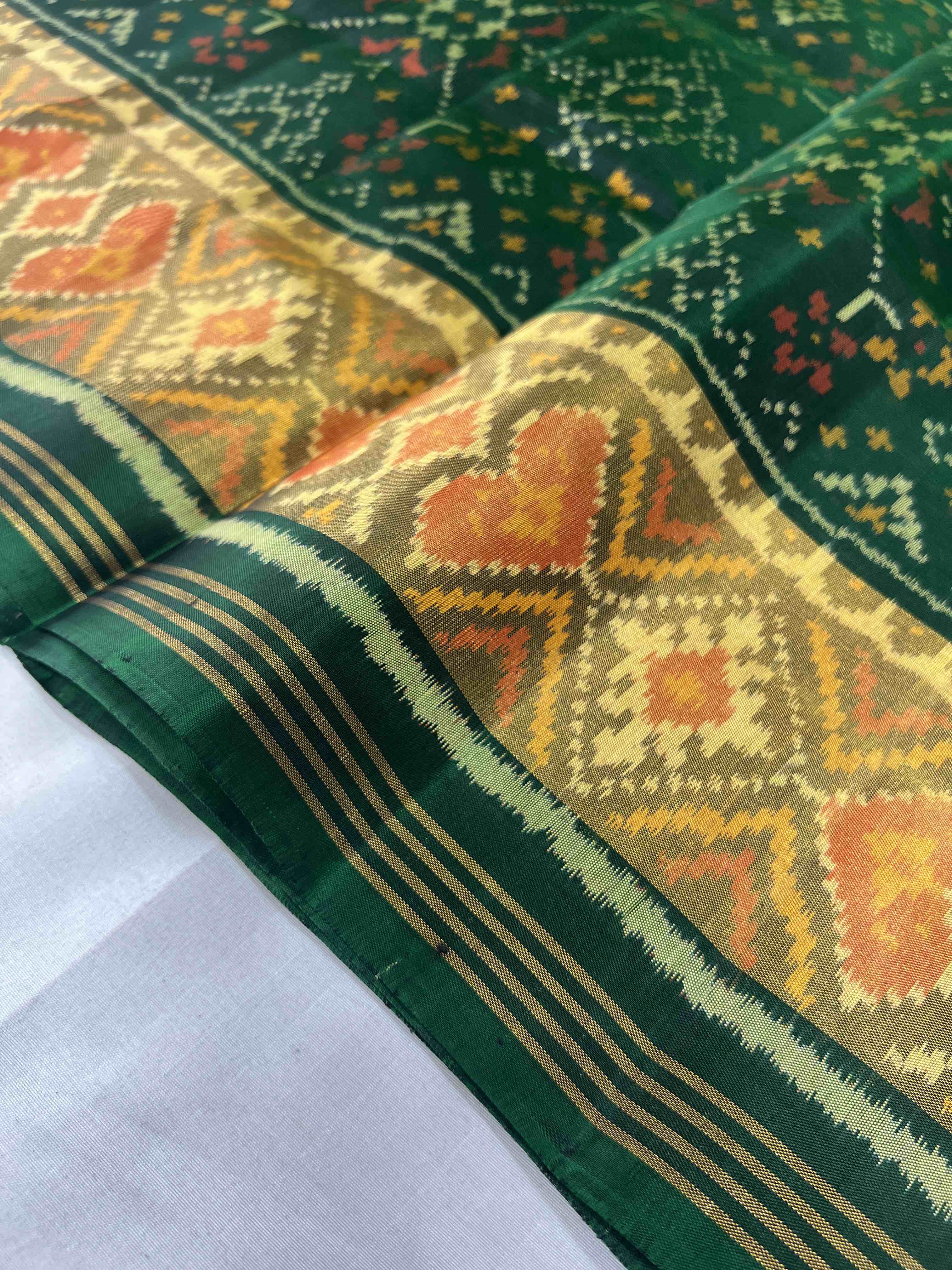 Green Navratna Traditional Design Handwoven Patola Silk Saree